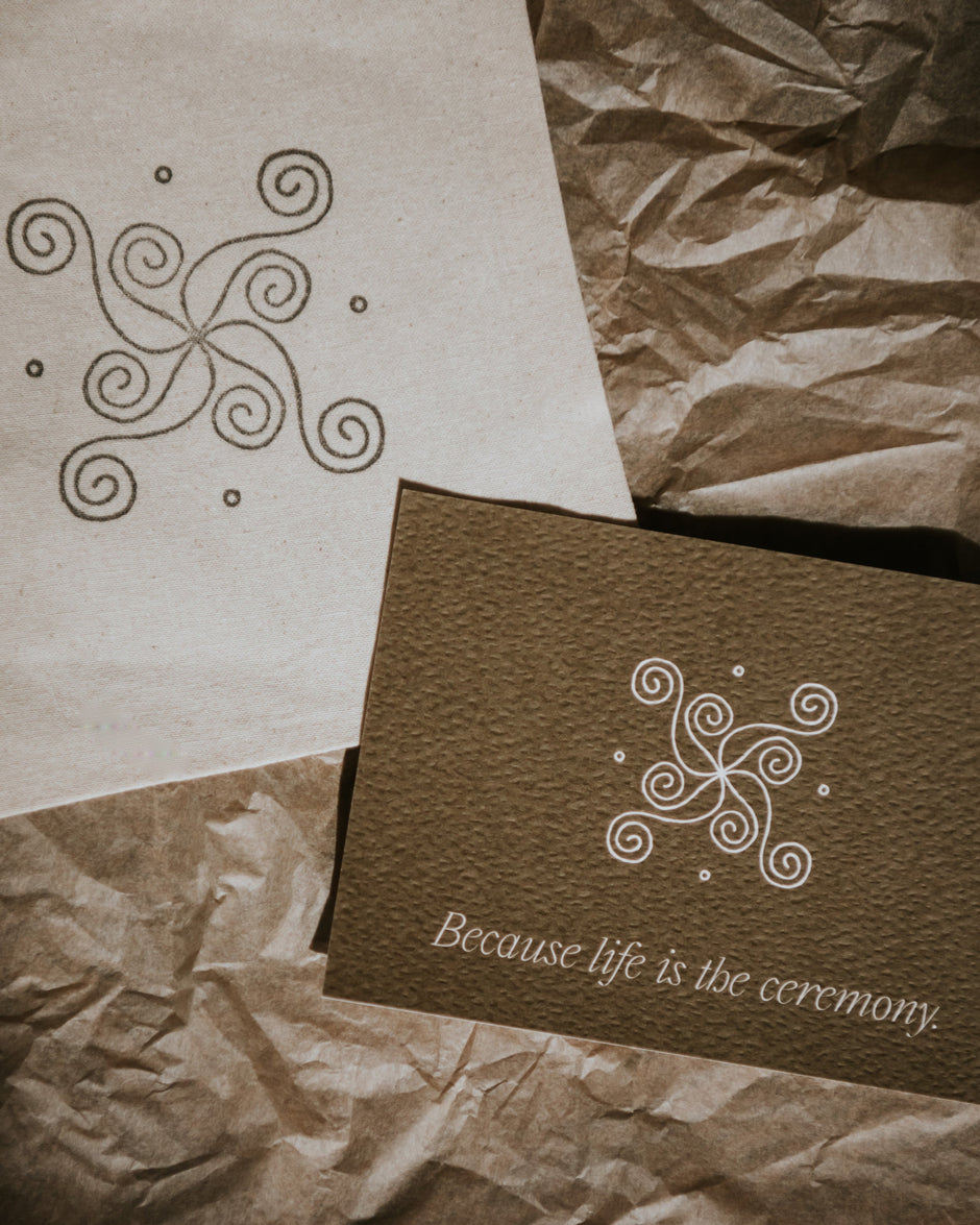 cotton pouch bag and textured postcard with submark by Cerita on brown paper background