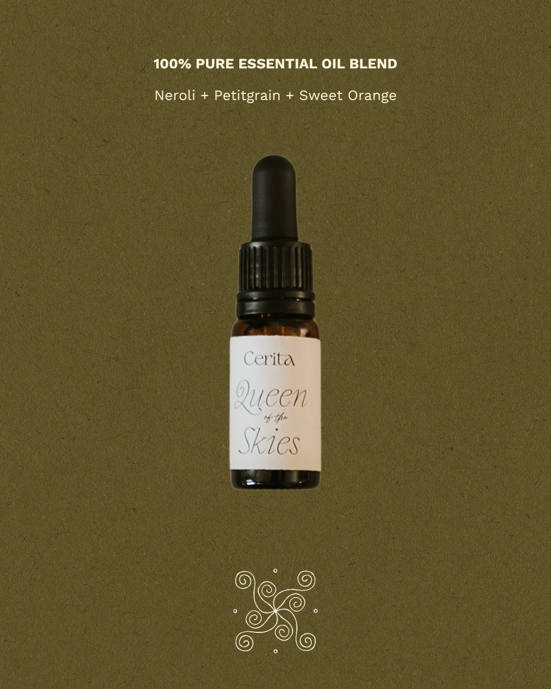 bottle of queen of the skies essential oil blend by Cerita on green background with fragrance notes text