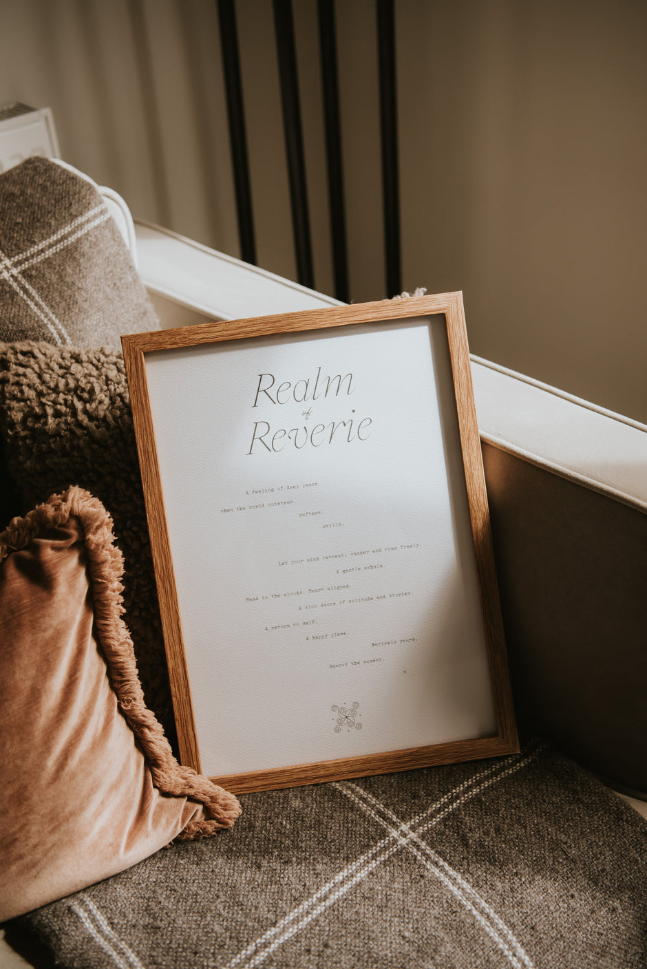framed realm of reverie typography art print by Cerita in neutral interior setting